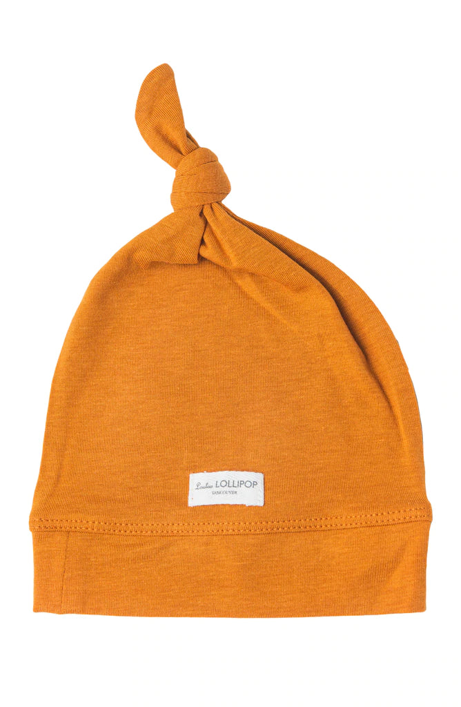 loulou lollipop top knot beanie - ginger honey